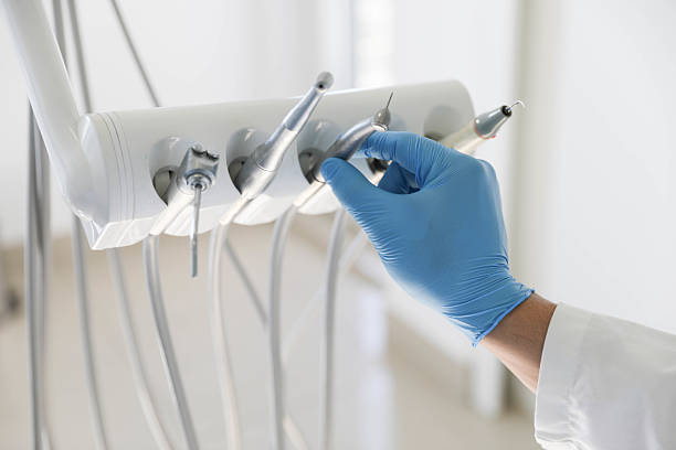 Professional Tooth Extraction technician working in Falfurrias, TX